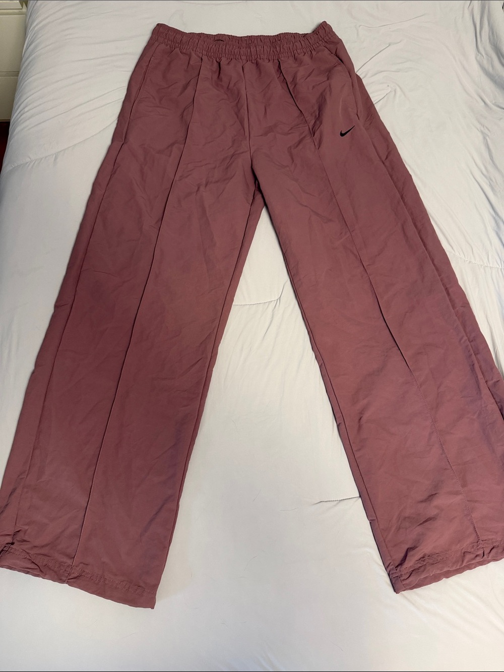 Nike Sportswear Everything Wovens Mauve Track Pants with Black Swoosh